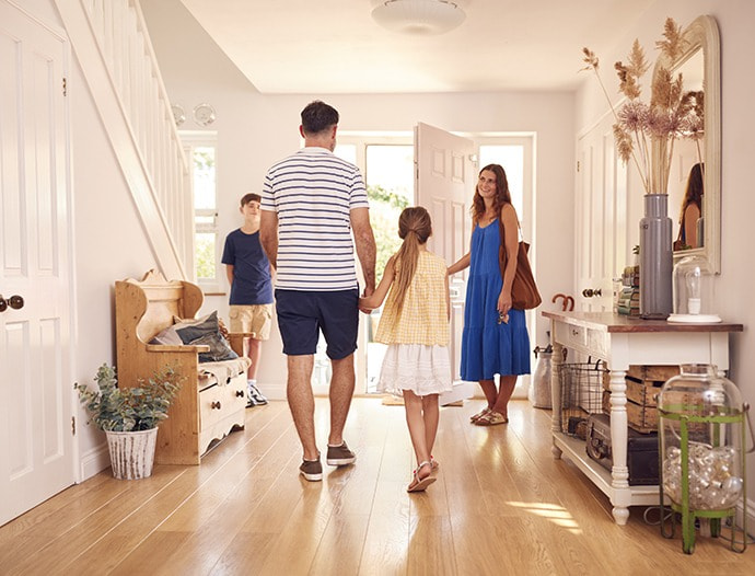 A family going out for the day through a composite door